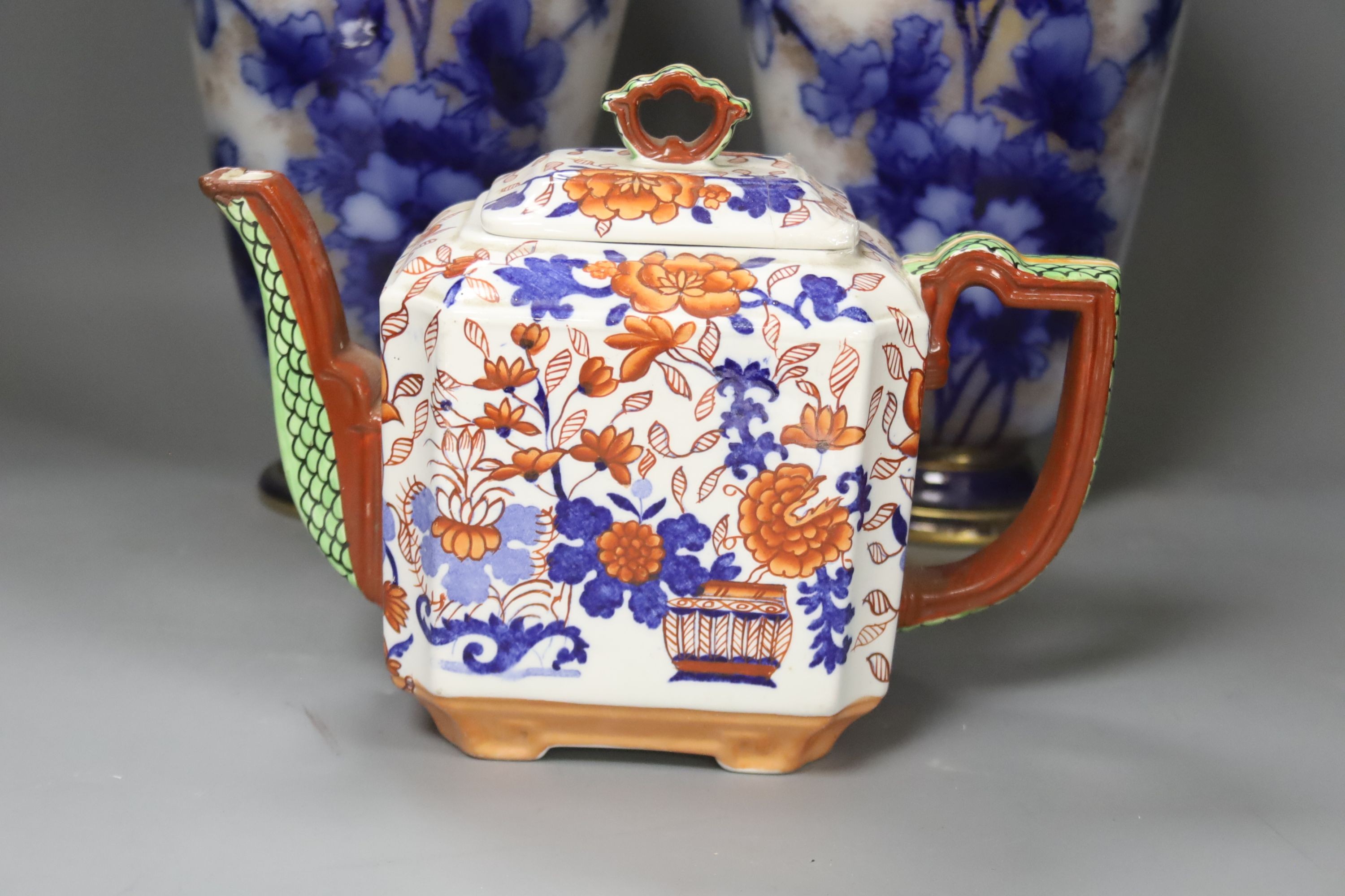 A pair of Doulton, Burslem vases c.1885, 44cm and a Masons ironstone teapot, c.1860